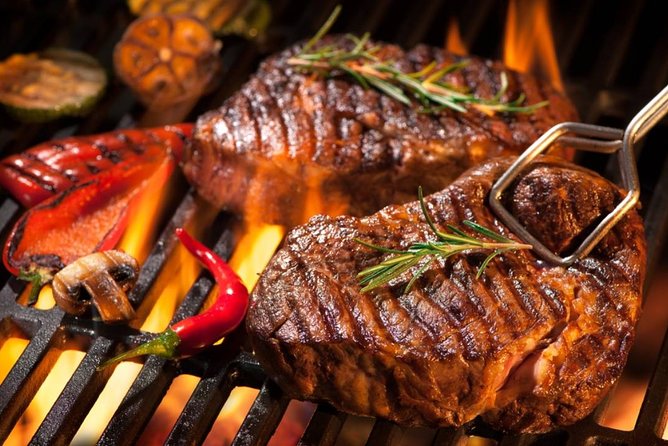 Nyama choma grilled meat dinner in Masai Mara safari camp